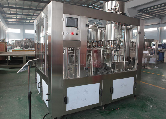 礦泉水沖洗灌裝封口三合一機(jī)組